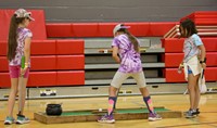 students playing mini golf