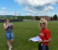 students participating in sixth grade field day event