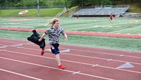 students participating in sixth grade field day event