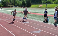 students participating in sixth grade field day event