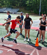 students participating in sixth grade field day event