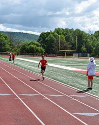 students participating in sixth grade field day event