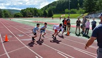 students participating in sixth grade field day event