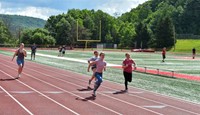 students participating in sixth grade field day event