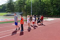 students participating in sixth grade field day event