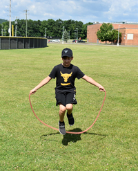 students participating in sixth grade field day event