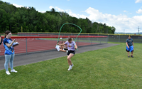 students participating in sixth grade field day event