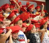 students at kindergarten graduation