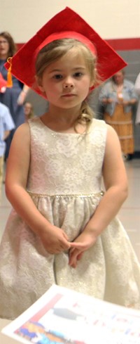 students at kindergarten graduation