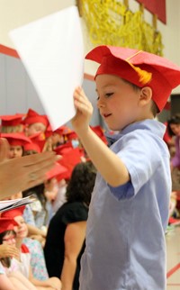 students at kindergarten graduation