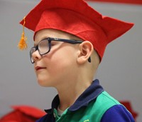 students at kindergarten graduation