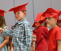 students at kindergarten graduation