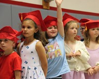 students at kindergarten graduation