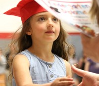 students at kindergarten graduation