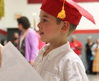 students at kindergarten graduation