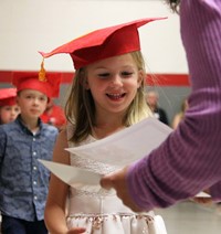 students at kindergarten graduation