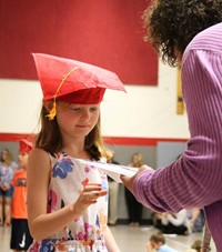 students at kindergarten graduation