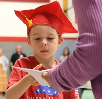 students at kindergarten graduation