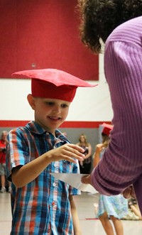 students at kindergarten graduation