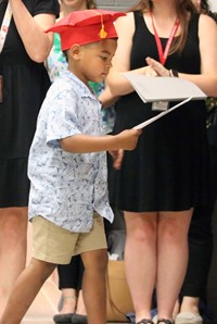 students at kindergarten graduation