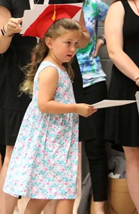 students at kindergarten graduation