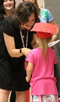 students at kindergarten graduation