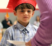 students at kindergarten graduation