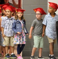 students at kindergarten graduation