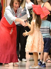 students at kindergarten graduation