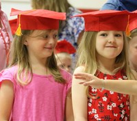 students at kindergarten graduation