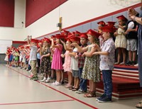 students at kindergarten graduation