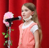 student at poetry recitation