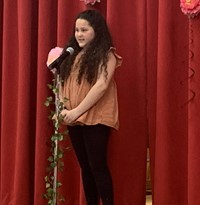 student at poetry recitation