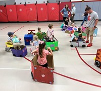 students and families at pre k family day