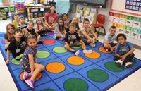 students and teacher on first day of school