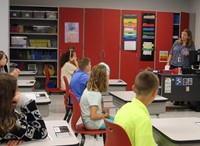 students and teacher on first day of school