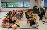 students and teacher on first day of school