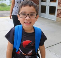 student on first day of school