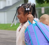 student on first day of school