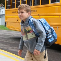 student on first day of school
