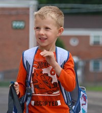 student on first day of school