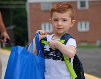 student on first day of school