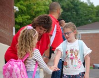 students and principal on first day of school