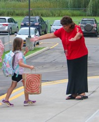 student and principal on first day of school