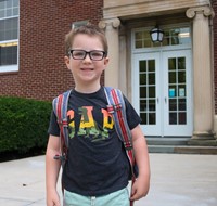 student on first day of school