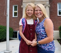 student and family member on first day of school