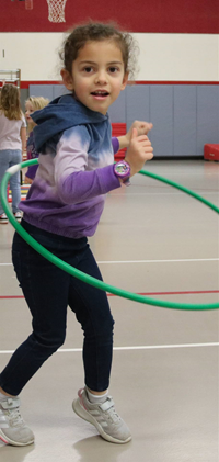 student hula hooping