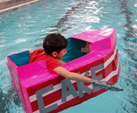 students participating in middle school boat races