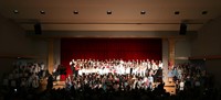 students singing in district choral concert