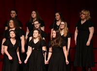 students singing in district choral concert